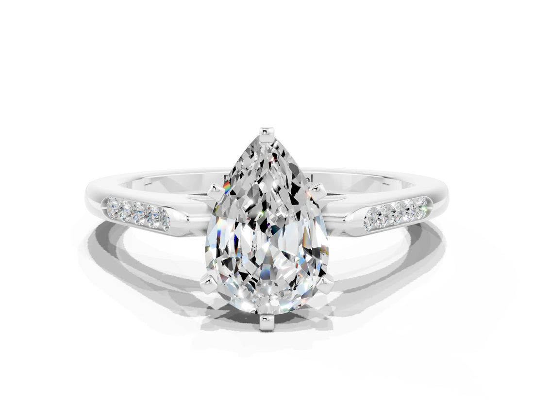 White gold Pear Cut Cut Channel Set Solitaire Engagement Ring with Four-Prong Setting