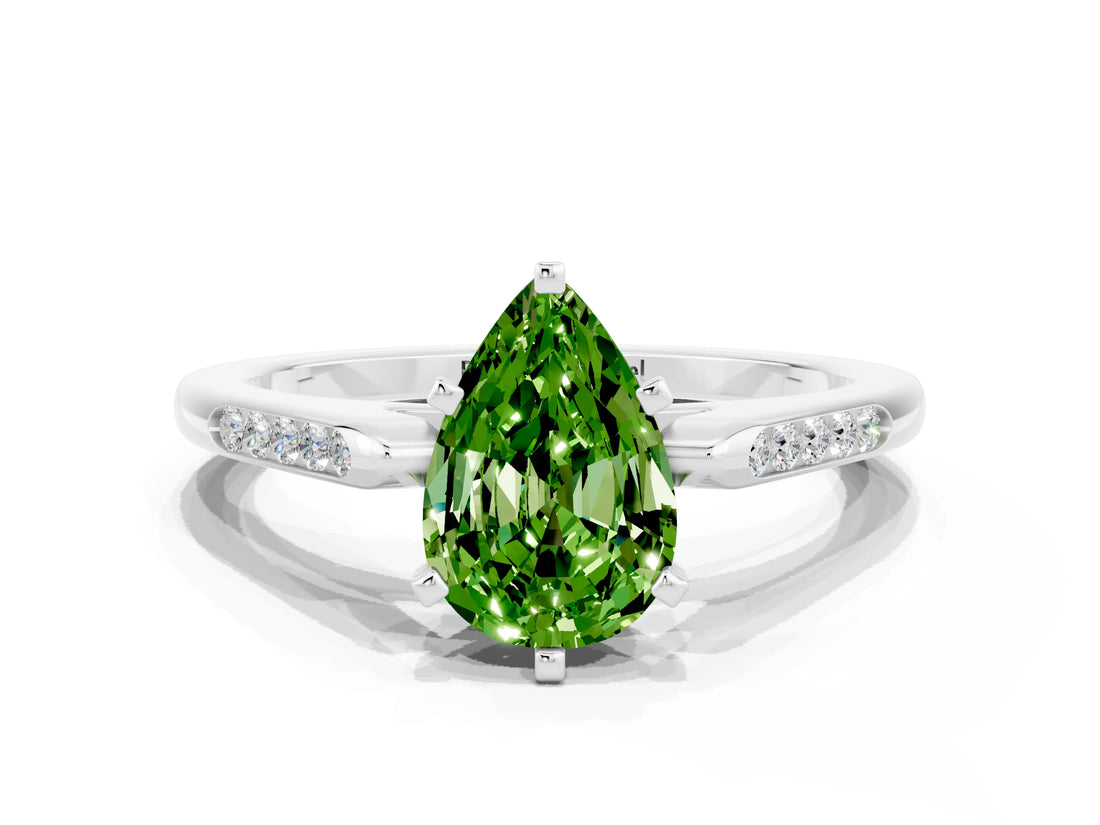 White gold Pear Cut Cut Channel Set Solitaire Engagement Ring with Four-Prong Setting