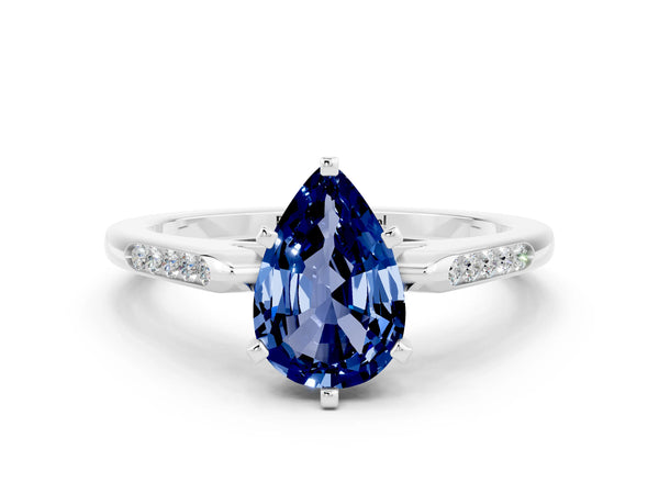 White gold Pear Cut Blue Sapphire Solitaire Ring with Channel Set Round Band and Prong Setting