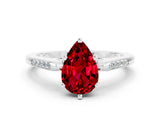 White gold Pear Cut Cut Channel Set Solitaire Engagement Ring with Four-Prong Setting