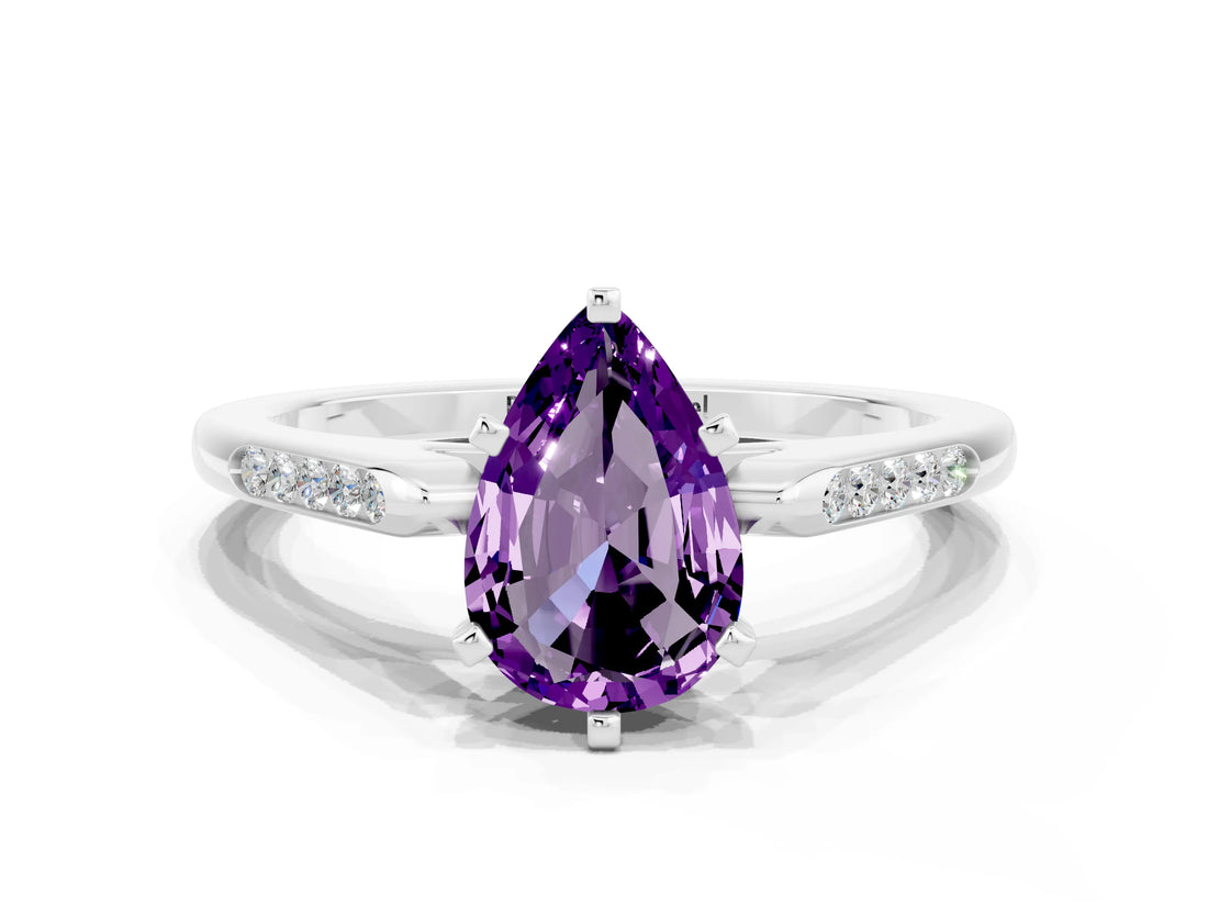 White gold Pear Cut Cut Channel Set Solitaire Engagement Ring with Four-Prong Setting