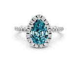 White gold Pear Cut Cut Diamond Floral Halo Engagement Ring with Pavé Band and Prong Setting