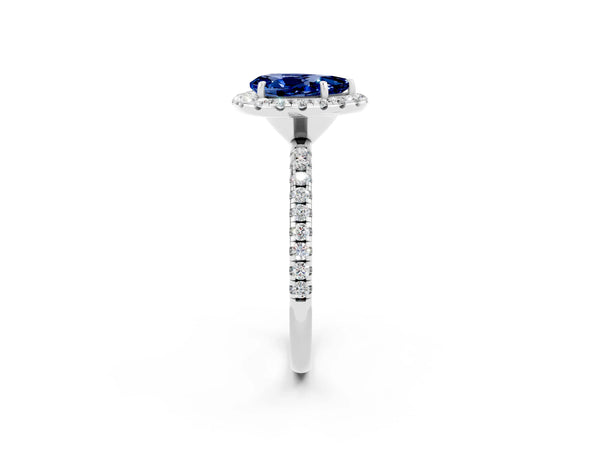 White gold Pear Cut Blue Sapphire Halo Engagement Ring with Round Pavé Band and Prong Setting
