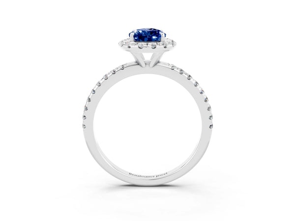White gold Pear Cut Blue Sapphire Halo Engagement Ring with Round Pavé Band and Prong Setting