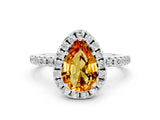 White gold Pear Cut Cut Diamond Floral Halo Engagement Ring with Pavé Band and Prong Setting
