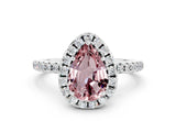 White gold Pear Cut Cut Diamond Floral Halo Engagement Ring with Pavé Band and Prong Setting