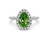 White gold Pear Cut Cut Diamond Floral Halo Engagement Ring with Pavé Band and Prong Setting