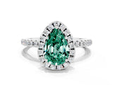 White gold Pear Cut Cut Diamond Floral Halo Engagement Ring with Pavé Band and Prong Setting