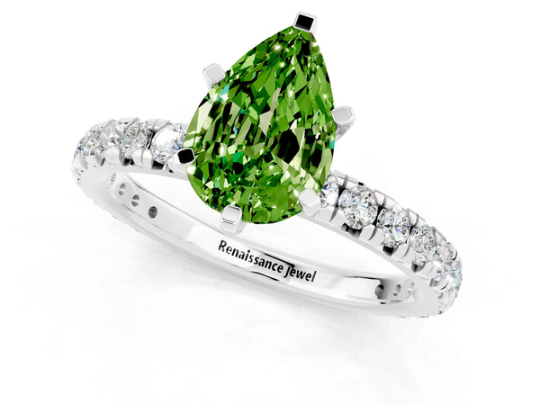 Platinum Pear Cut Cut Diamond Pavé Band with Four-Prong Setting