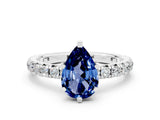 White gold Pear Cut Cut Diamond Pavé Band with Four-Prong Setting