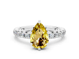 White gold Pear Cut Cut Diamond Pavé Band with Four-Prong Setting