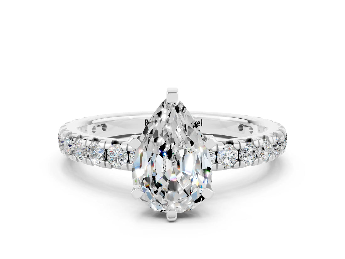 White gold Pear Cut Cut Diamond Pavé Band with Four-Prong Setting