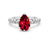 White gold Pear Cut Cut Diamond Pavé Band with Four-Prong Setting