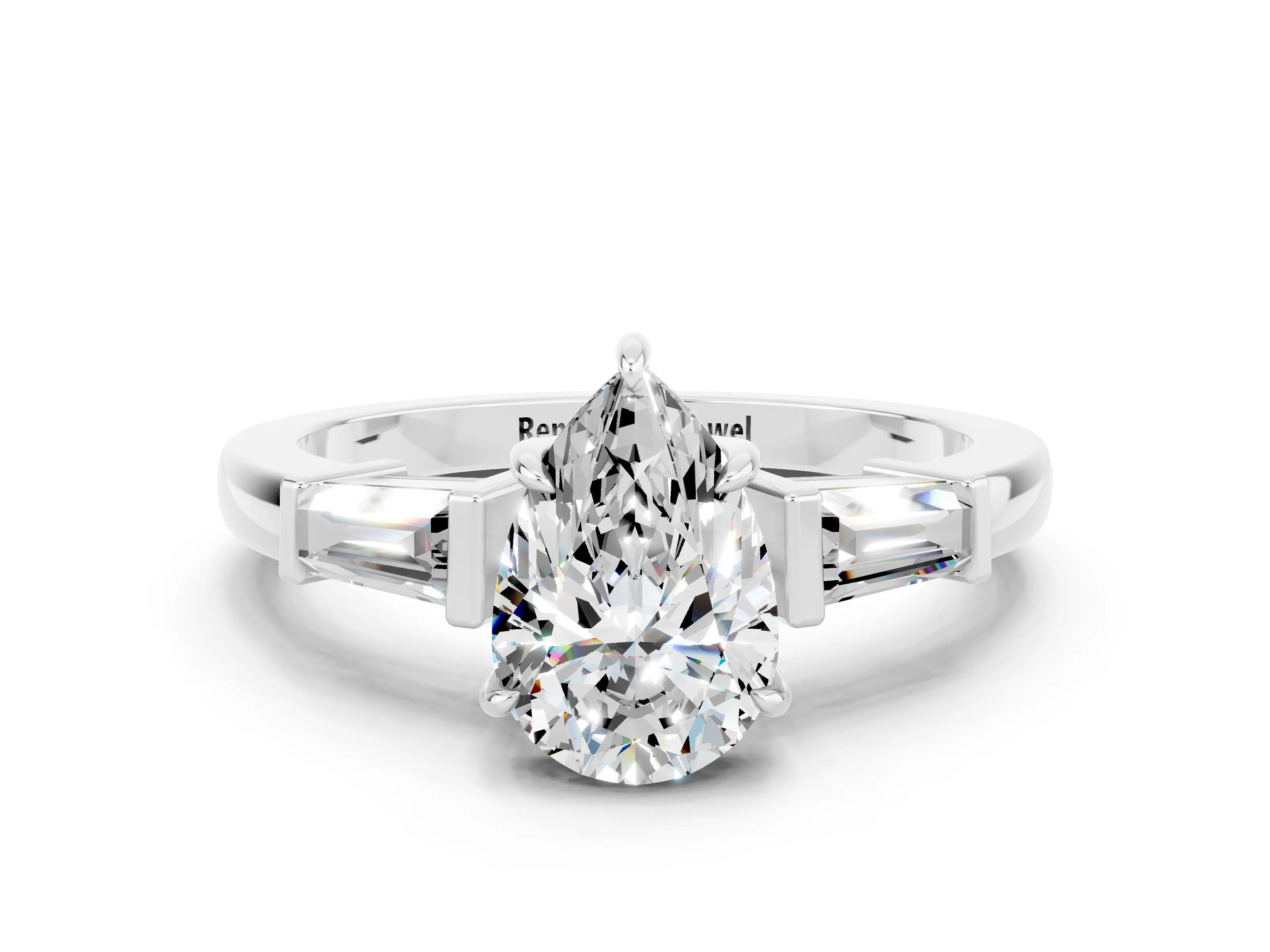White gold Pear Cut Cut Diamond Ring with Tapered Baguette Side Stones in Four-Prong Setting