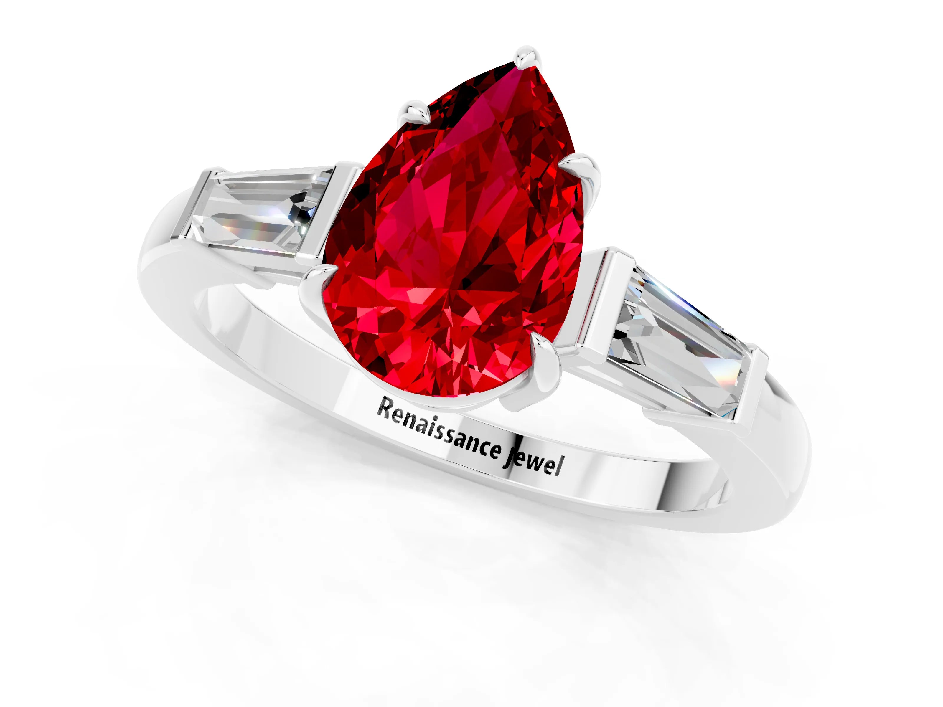 White gold Pear Cut Cut Diamond Ring with Tapered Baguette Side Stones in Four-Prong Setting_1