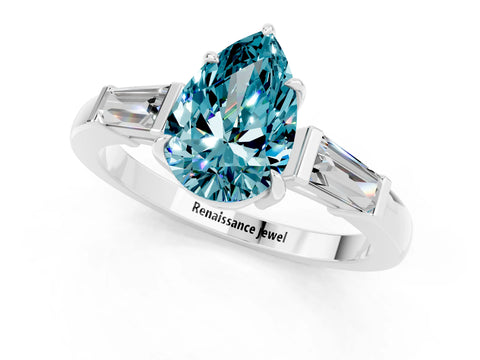 White gold Pear Cut Cut Diamond Ring with Tapered Baguette Side Stones in Four-Prong Setting_1