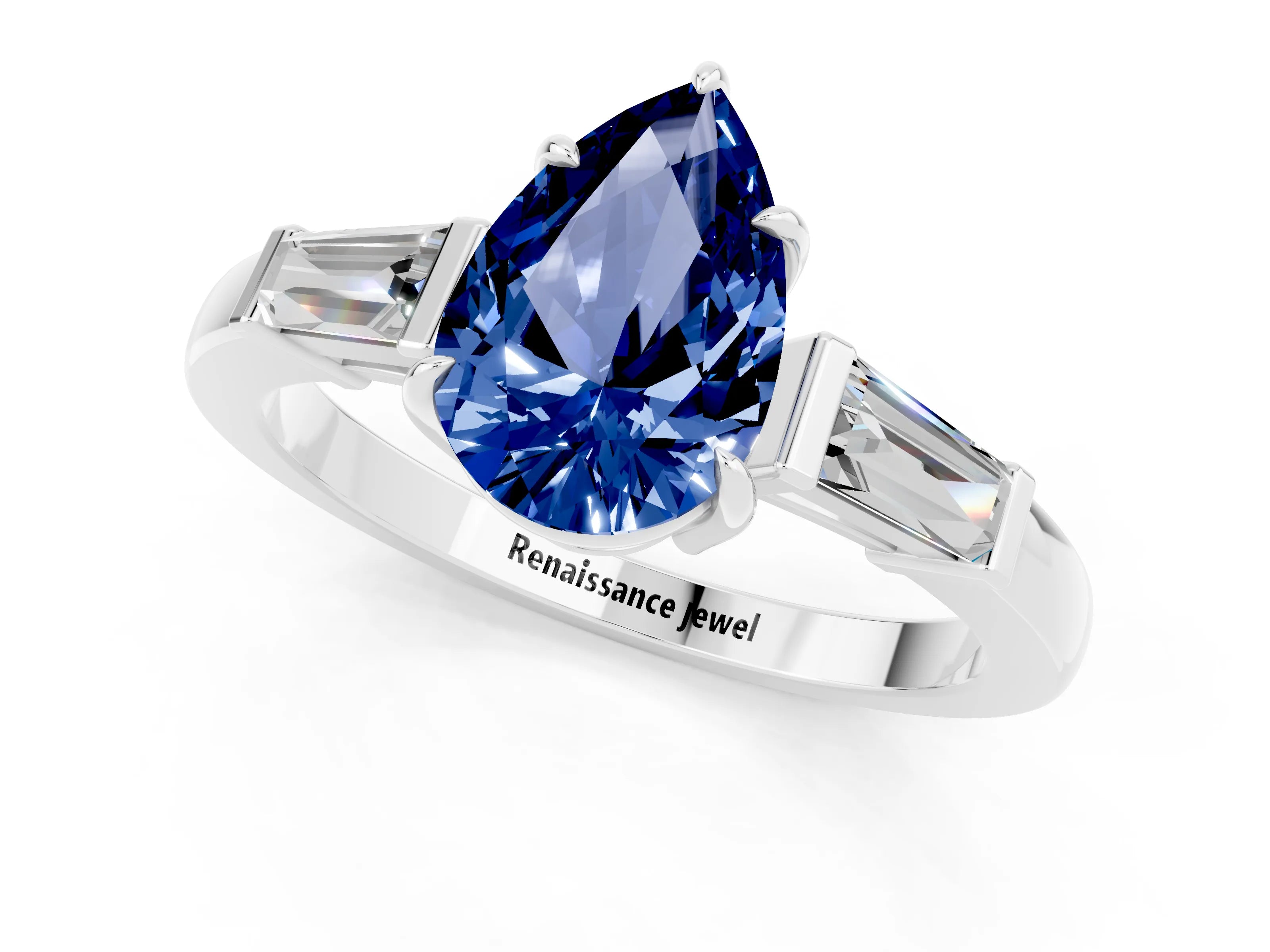 White gold Pear Cut Cut Diamond Ring with Tapered Baguette Side Stones in Four-Prong Setting_1
