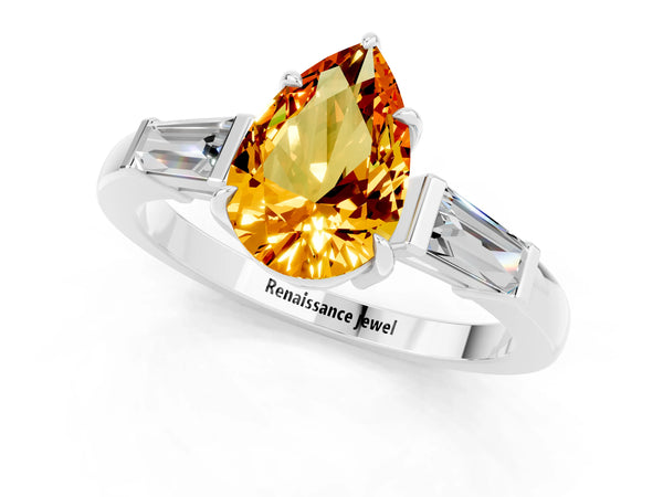 Silver Pear Cut Citrine Three-Stone Ring with Tapered Baguette Side Stones and Prong Setting