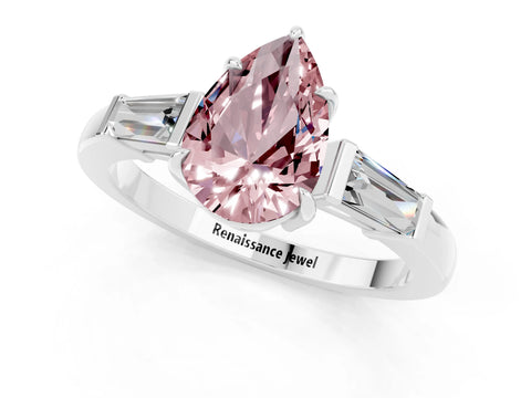 White gold Pear Cut Cut Diamond Ring with Tapered Baguette Side Stones in Four-Prong Setting_1