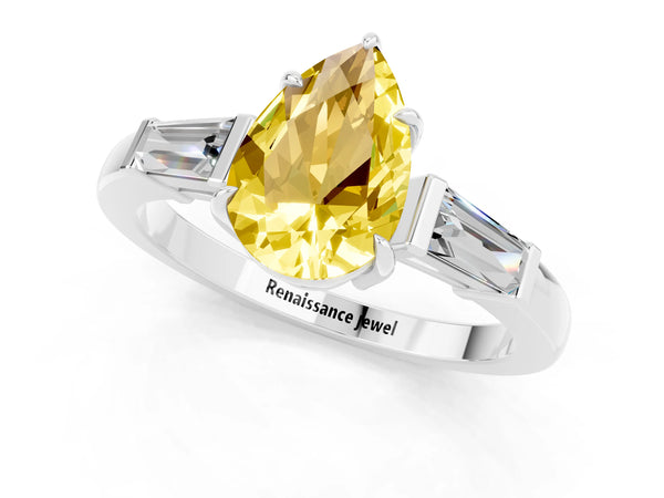 Silver Pear Cut Yellow Sapphire Three-Stone Ring with Tapered Baguette Side Stones and Prong Setting
