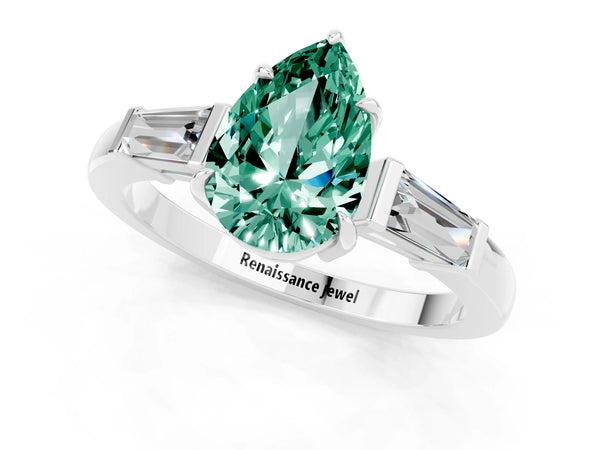 Silver Pear Cut Green Sapphire Three-Stone Ring with Tapered Baguette Side Stones and Prong Setting