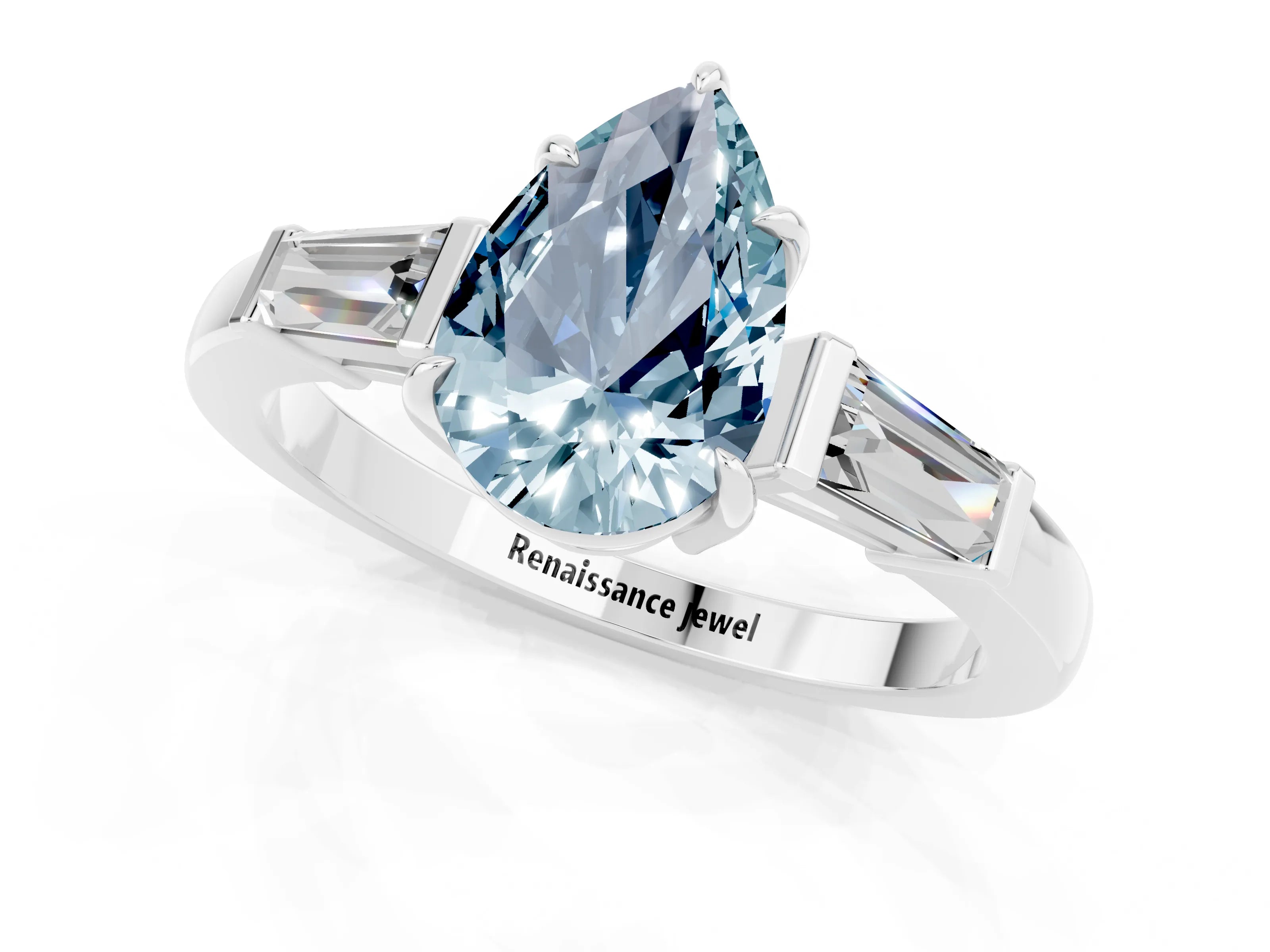 White gold Pear Cut Cut Diamond Ring with Tapered Baguette Side Stones in Four-Prong Setting_1