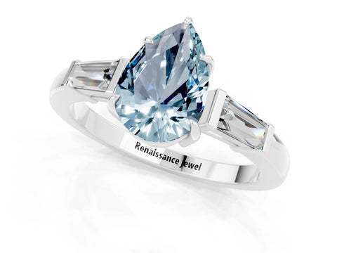 White gold Pear Cut Cut Diamond Ring with Tapered Baguette Side Stones in Four-Prong Setting_1