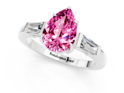 White gold Pear Cut Cut Diamond Ring with Tapered Baguette Side Stones in Four-Prong Setting_1