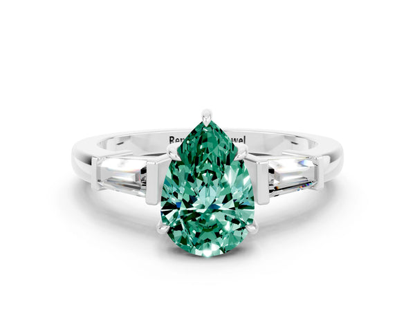 White gold Pear Cut Green Sapphire Three-Stone Ring with Tapered Baguette Side Stones and Prong Setting