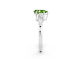 White gold Pear Cut Cut Diamond Ring with Tapered Baguette Side Stones in Four-Prong Setting_2