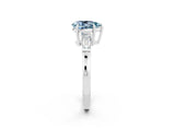 White gold Pear Cut Cut Diamond Ring with Tapered Baguette Side Stones in Four-Prong Setting_2