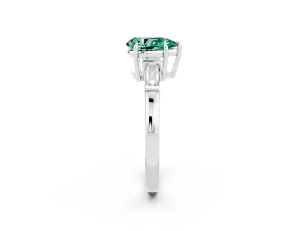 Platinum Pear Cut Green Sapphire Three-Stone Ring with Tapered Baguette Side Stones and Prong Setting