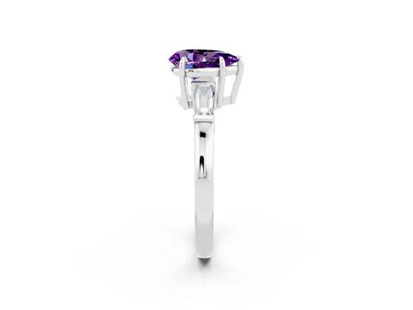 White gold Pear Cut Amethyst Three-Stone Ring with Tapered Baguette Side Stones and Prong Setting
