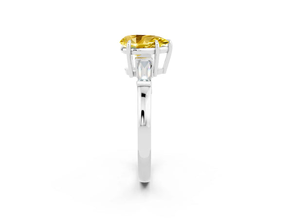 Platinum Pear Cut Yellow Sapphire Three-Stone Ring with Tapered Baguette Side Stones and Prong Setting