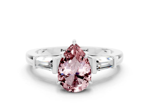 White gold Pear Cut Cut Diamond Ring with Tapered Baguette Side Stones in Four-Prong Setting