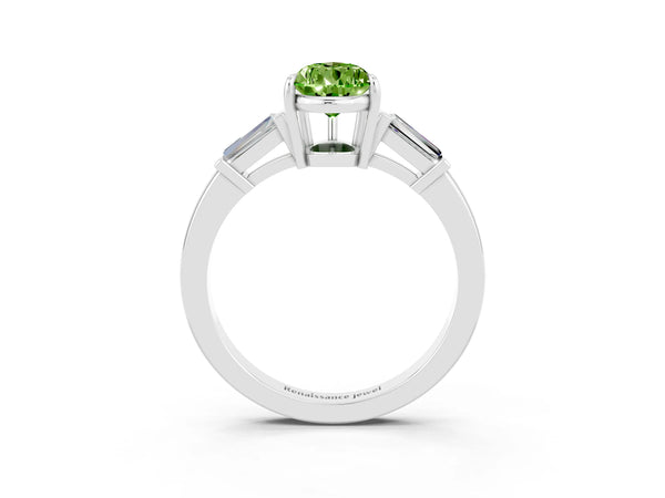 Silver Pear Cut Cut Diamond Ring with Tapered Baguette Side Stones in Four-Prong Setting