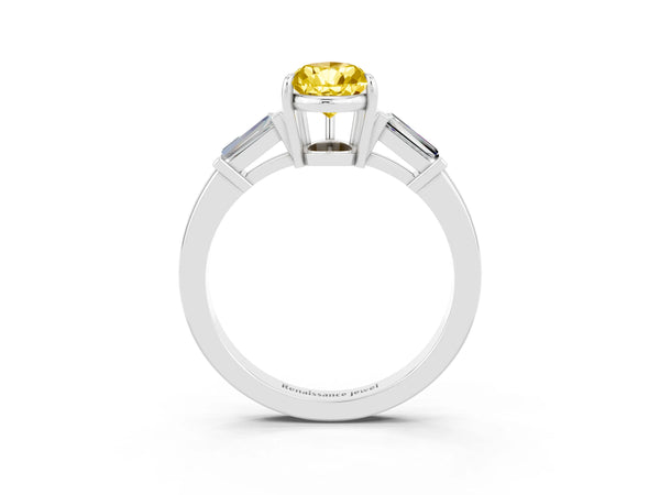 White gold Pear Cut Yellow Sapphire Three-Stone Ring with Tapered Baguette Side Stones and Prong Setting