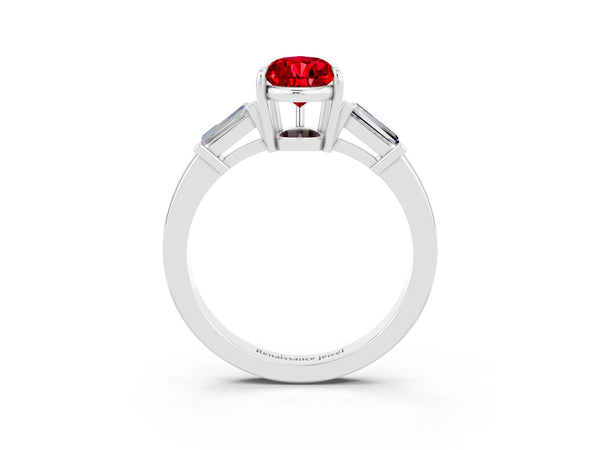Platinum Pear Cut Cut Diamond Ring with Tapered Baguette Side Stones in Four-Prong Setting