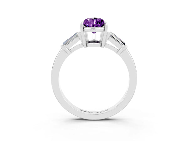 Platinum Pear Cut Amethyst Three-Stone Ring with Tapered Baguette Side Stones and Prong Setting