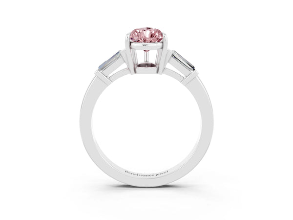 Silver Pear Cut Cut Diamond Ring with Tapered Baguette Side Stones in Four-Prong Setting