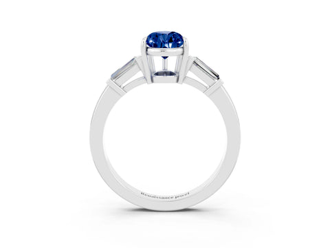 White gold Pear Cut Cut Diamond Ring with Tapered Baguette Side Stones in Four-Prong Setting_3