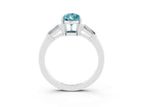 White gold Pear Cut Cut Diamond Ring with Tapered Baguette Side Stones in Four-Prong Setting_3