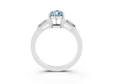 White gold Pear Cut Cut Diamond Ring with Tapered Baguette Side Stones in Four-Prong Setting_3