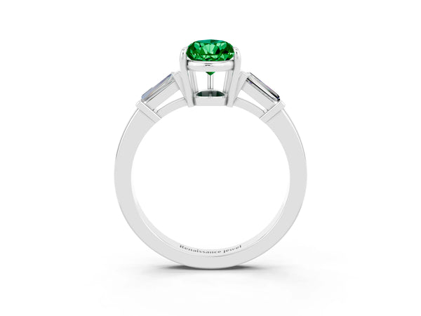 Silver Pear Cut Emerald Three-Stone Ring with Tapered Baguette Side Stones and Prong Setting