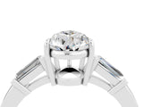 White gold Pear Cut Cut Diamond Ring with Tapered Baguette Side Stones in Four-Prong Setting_4