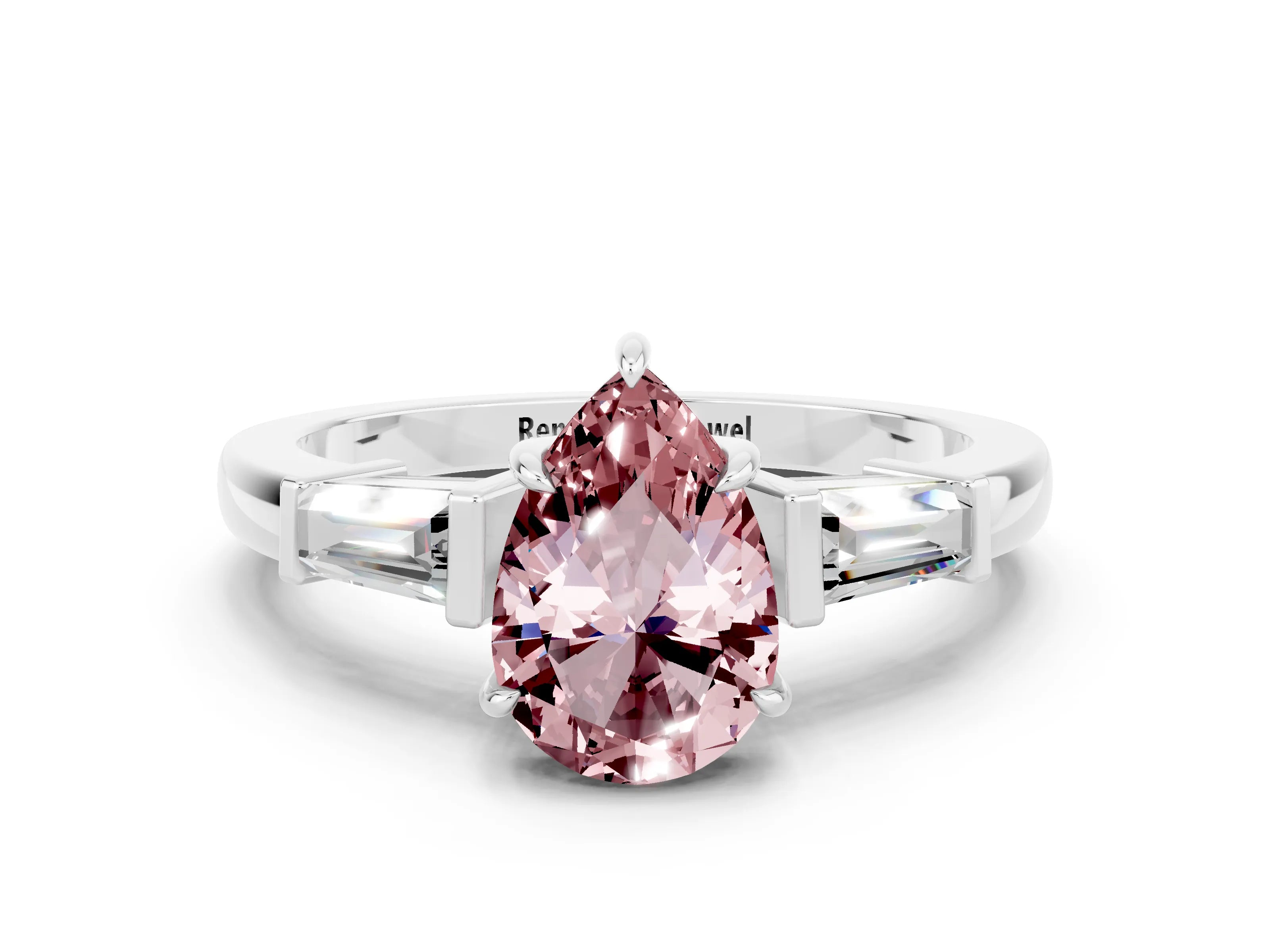 White gold Pear Cut Cut Diamond Ring with Tapered Baguette Side Stones in Four-Prong Setting
