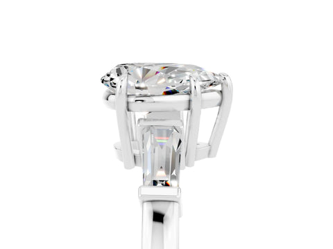 White gold Pear Cut Cut Diamond Ring with Tapered Baguette Side Stones in Four-Prong Setting_5