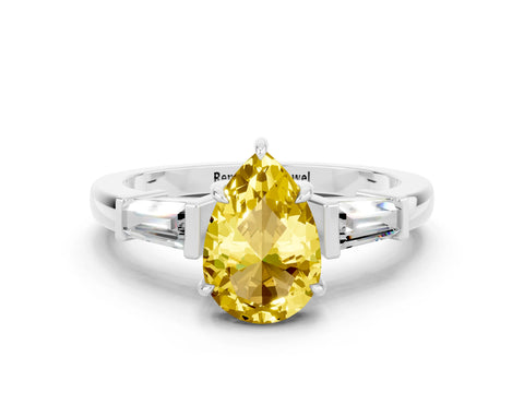 White gold Pear Cut Cut Diamond Ring with Tapered Baguette Side Stones in Four-Prong Setting