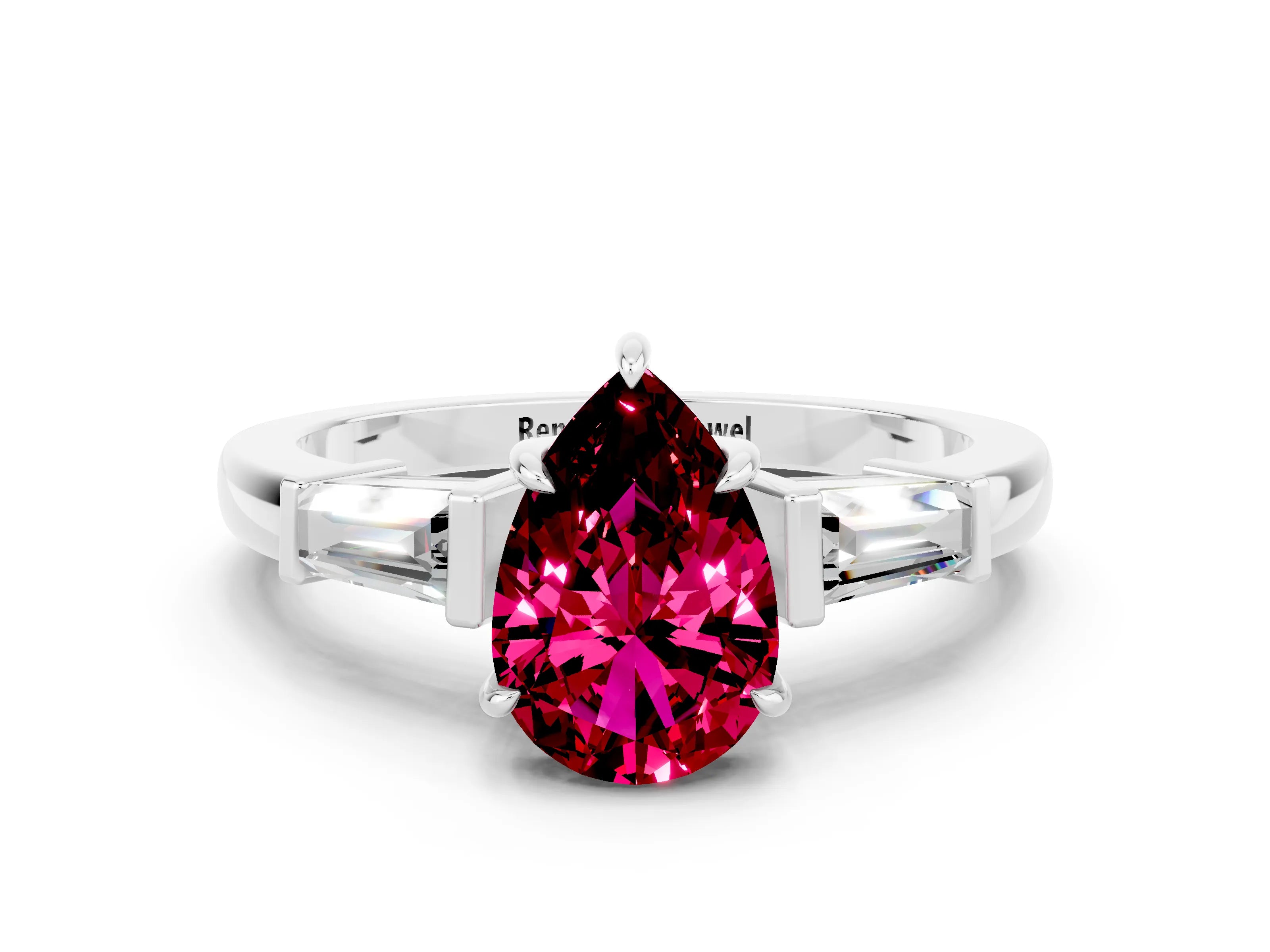 White gold Pear Cut Cut Diamond Ring with Tapered Baguette Side Stones in Four-Prong Setting