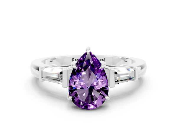 Platinum Pear Cut Amethyst Three-Stone Ring with Tapered Baguette Side Stones and Prong Setting